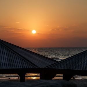 Scenic view of sea at sunset