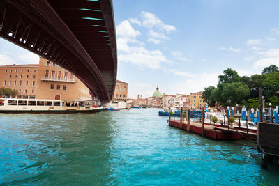 View of swimming pool bridge over canal