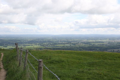 Scenic view of field against sky