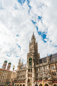 Low angle view of buildings in city against sky