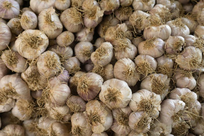 Full frame shot of onions for sale in market