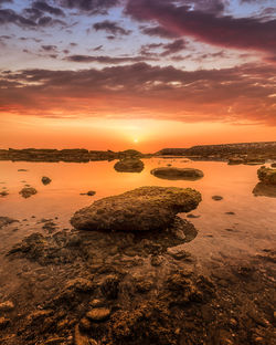 Scenic view of sea against sky during sunset