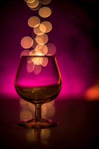 Close-up of wineglass on table