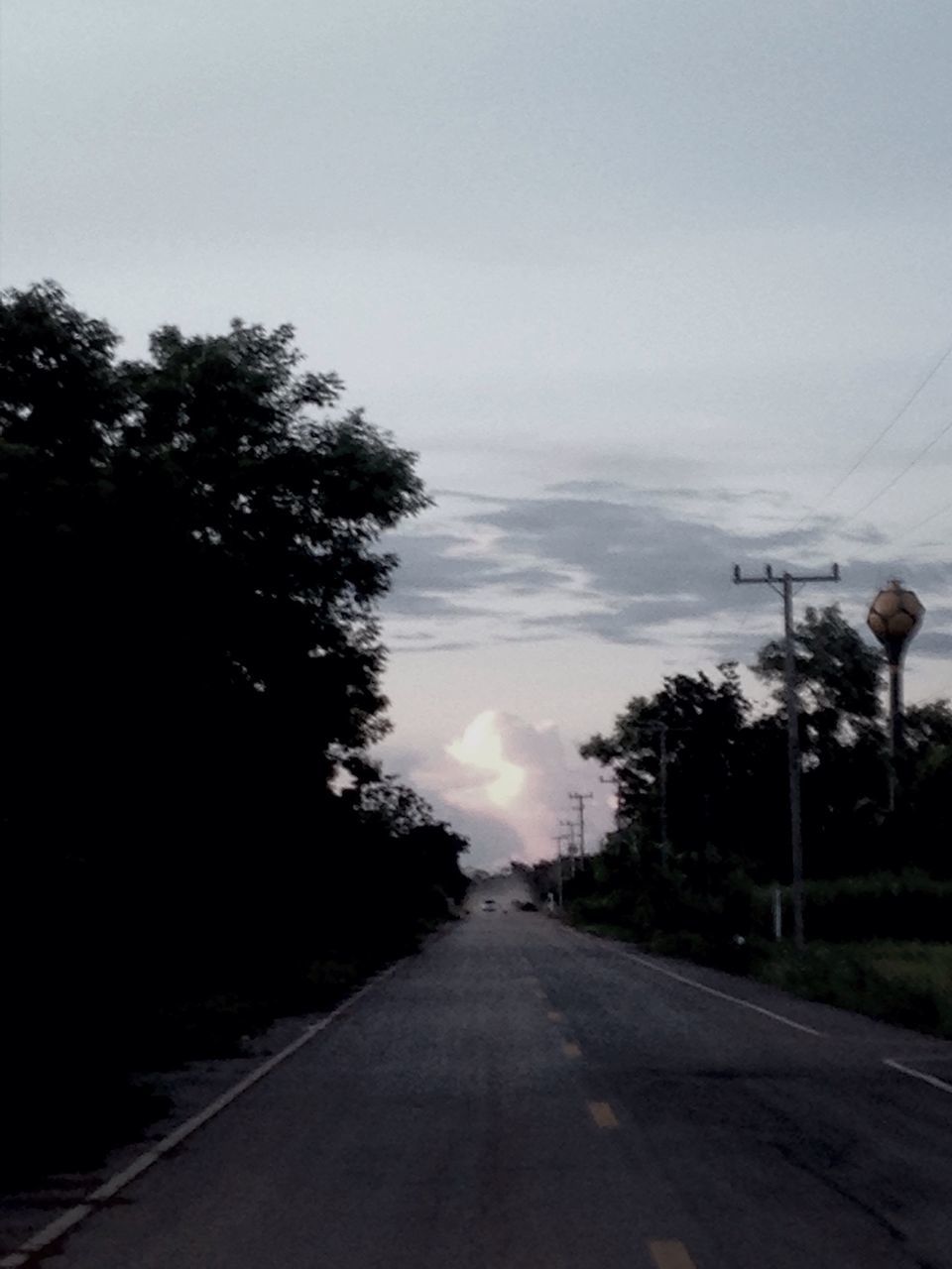 the way forward, transportation, road, diminishing perspective, road marking, tree, vanishing point, sky, empty road, country road, empty, street, long, car, silhouette, outdoors, no people, asphalt, cloud - sky, nature