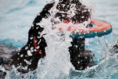 Close-up of water splashing in sea