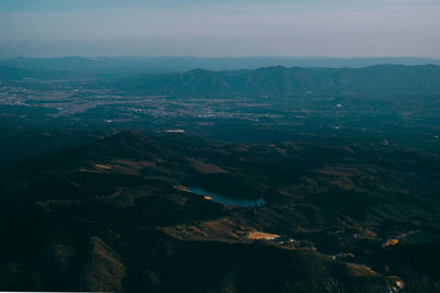 Aerial view of cityscape against sky