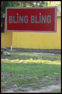 Close-up of information sign on field