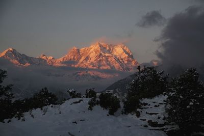 Scenic view of snow covered mountains