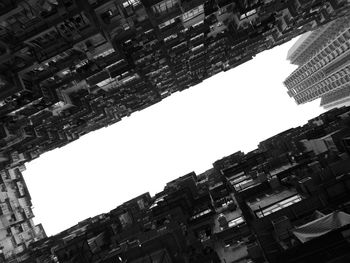 Low angle view of city against clear sky