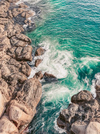 High angle view of rocks on beach