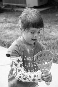 Close-up of boy wearing hat