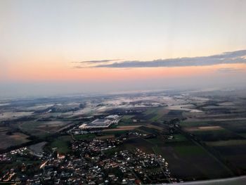 High angle view of townscape against sky at sunset