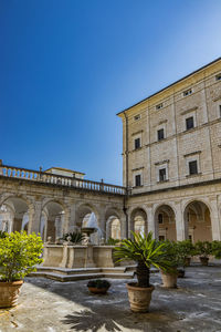 View of historical building against blue sky