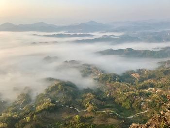 Aerial view of mountains against sky