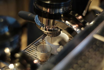 High angle view of espresso maker in cafe