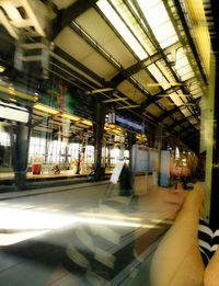 Blurred motion of train at railroad station