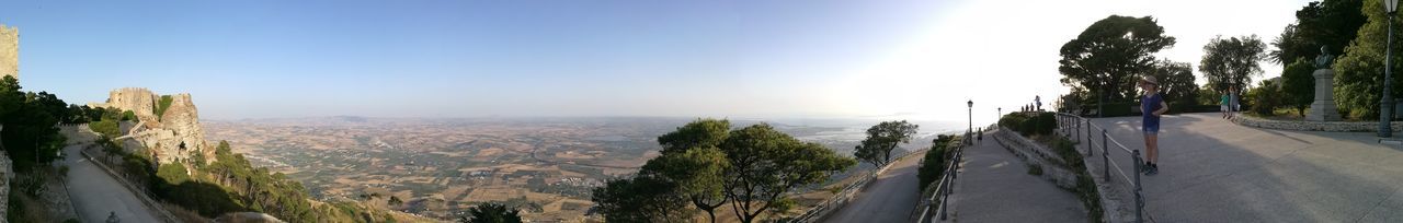 Panoramic view of road along sea