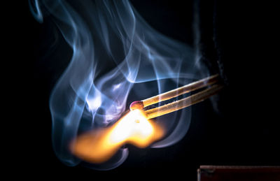 Close-up of smoke against black background