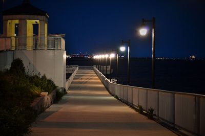 Empty walkway at night