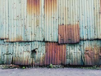 Old rusty door in abandoned building