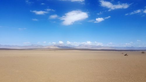 Scenic view of desert against sky