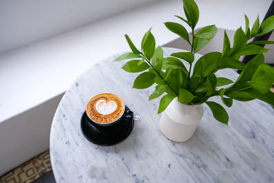 High angle view of cappuccino on table