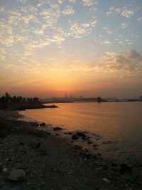 Scenic view of sea at sunset