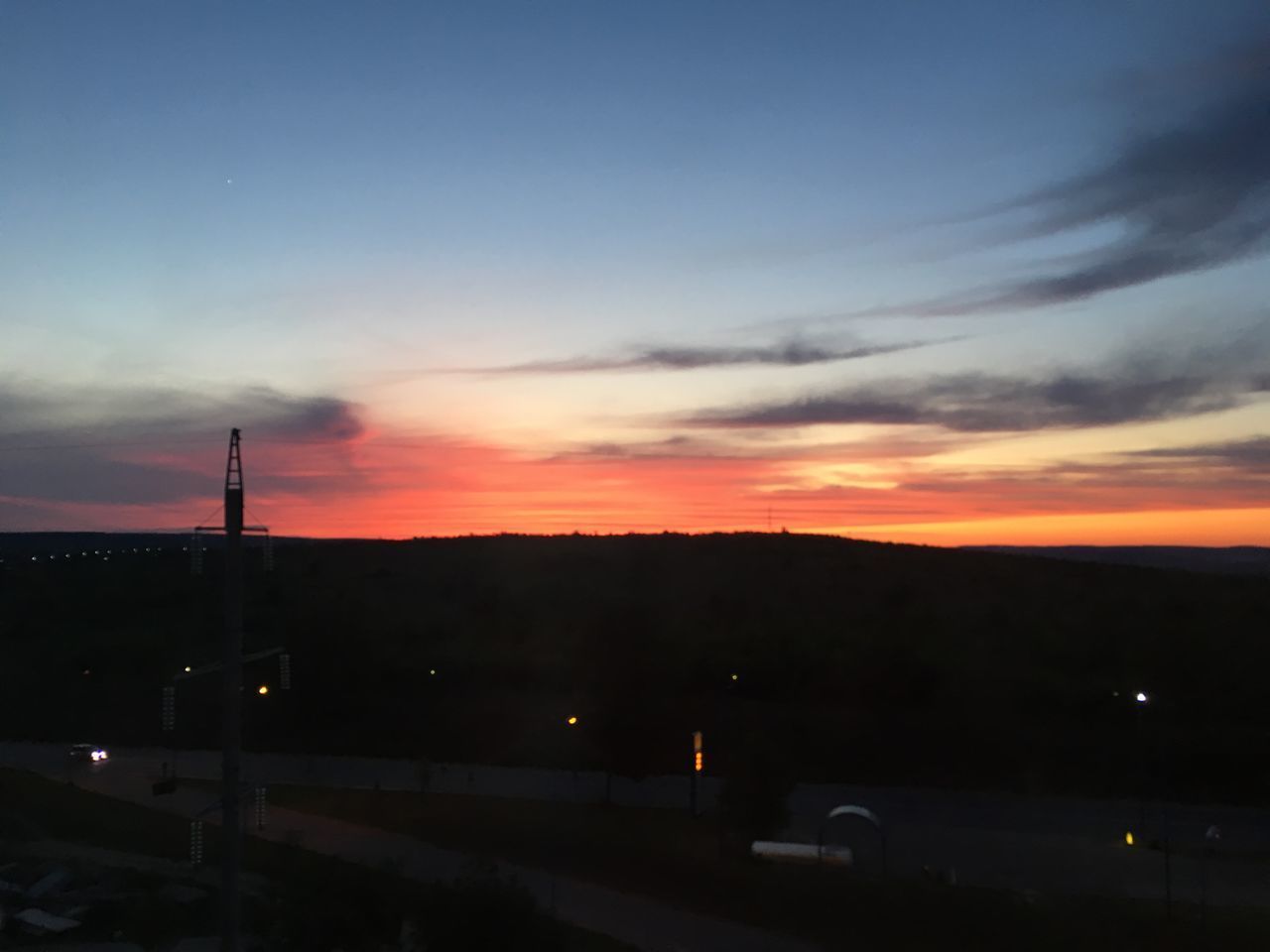 SILHOUETTE CITY AGAINST SKY DURING SUNSET