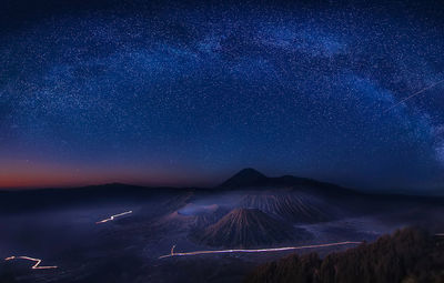 Scenic view of star field against sky at night