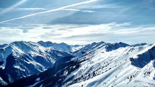 Scenic view of snow covered mountains