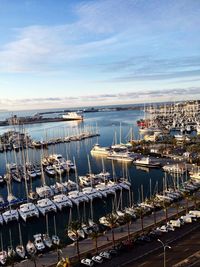 Boats moored at harbor