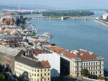 High angle view of townscape by sea