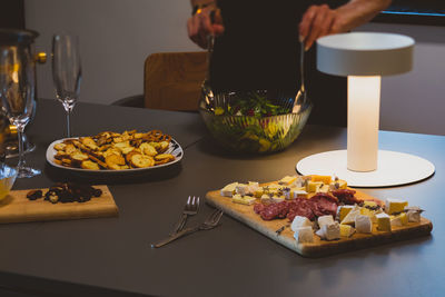 Man preparing food on table