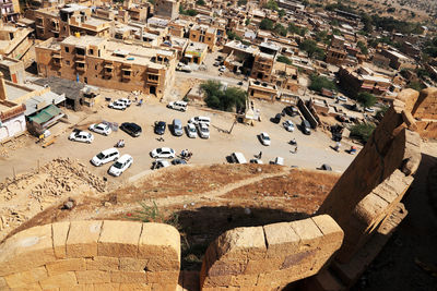 Aerial view of cars on street seen from fort