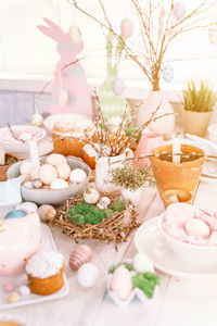 Happy easter and spring holidays time. festive tablescape set decor. traditional easter dinner food