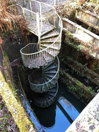 High angle view of footbridge over canal