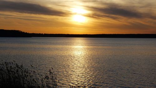 Scenic view of sea at sunset