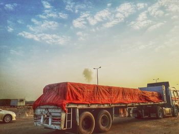 Cars on road against clear sky