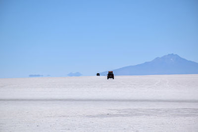 Scenic view of desert against clear sky