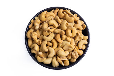 Directly above shot of pasta in bowl against white background