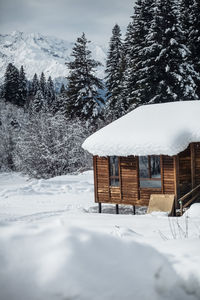 Wooden hut in the mountains in winter