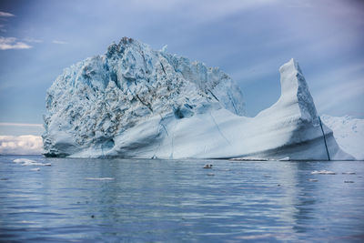 Scenic view of frozen lake against sky