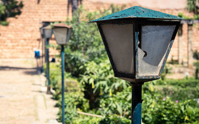 Close-up of lamp post on street