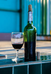 Close-up of beer bottle on floor