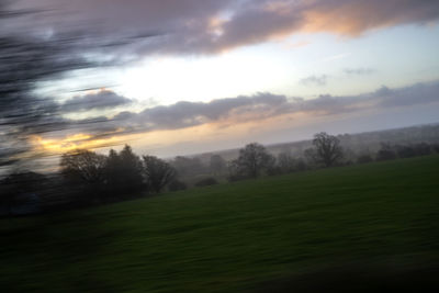 Scenic view of landscape against sky during sunset