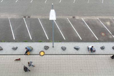 High angle view of people on sidewalk