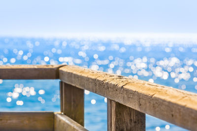 Pier over sea against clear sky