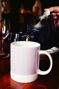 Close-up of coffee cup on table