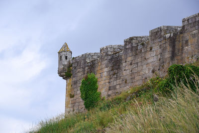 Watchtower and stone wall of a castle