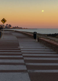 Scenic view of sea against clear sky during sunset